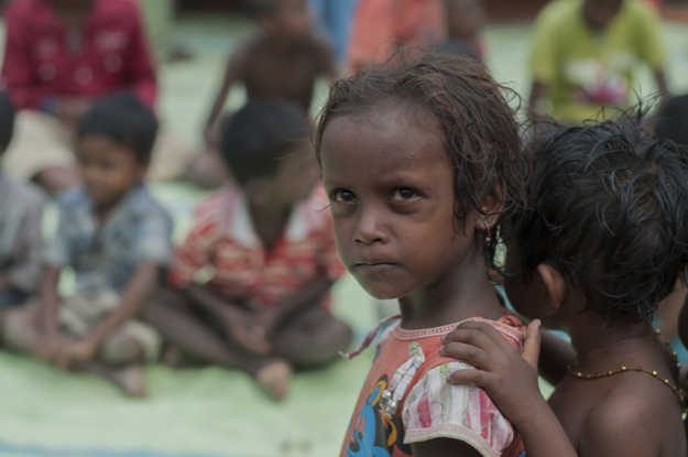 Two children working under tough conditions